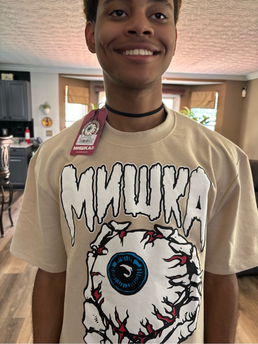 Mishka Beige Short-Sleeve Tee with Graphic Eyeball and Dripping Logo - Picture 2 of 7